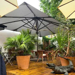 Large rectangular umbrella, parasol, with heat and light in South London Large rectangular umbrella in South London Coffee Shop on a portable base