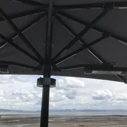 Marine Umbrella Systems Giant Patio Marine Umbrella by the sea